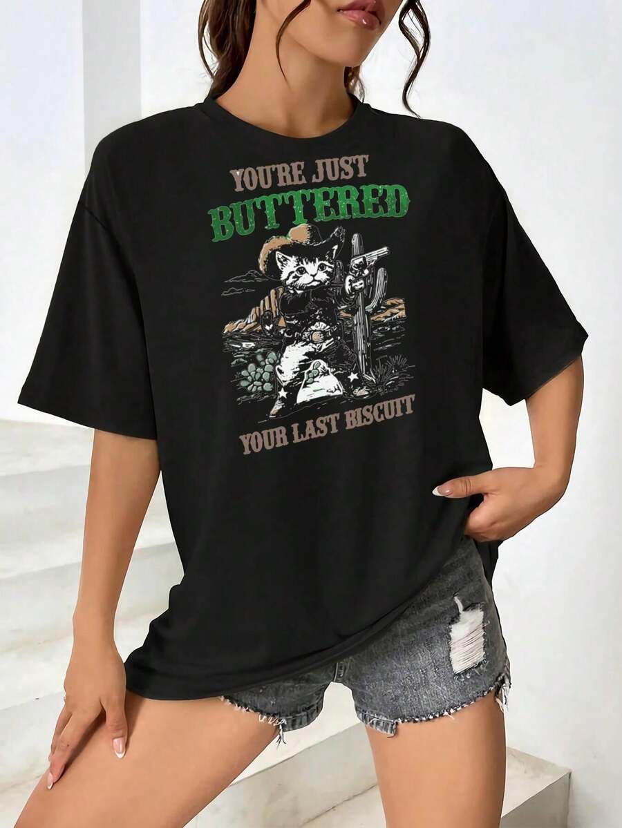 Camiseta divertida de vaquera con gato para mujer | Camiseta gráfica con humor occidental | Diseño único de cactus del desierto | Camiseta de manga corta para mujer y hombre - Negro - Ver 1