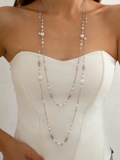 1 set med 2 lyxiga eleganta halsband med konstpärlor, vintage tofskedja, utsökt ihålig blomkedja långt halsband och hänge lämpligt för kvinnor vardags-, resort- och festkläder