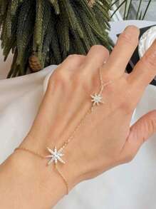 Un conjunto de joyería de un solo pieza con brazalete, cadena de mano y anillo con diamantes de imitación con diseño de estrella en estilo japonés para mujeres