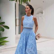 Conjunto de dos piezas para dama de estilo moda de resort de verano con bordado, top corto de cintura alta con bolsillos y falda vaporosa de media falda como ropa de playa
