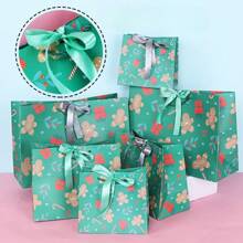 Sacola de presente com laço, sacola de presente de véspera de Natal, sacola de papel, sacola de presente
