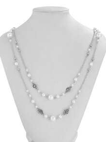 1 set de 2 colliers superposés de style chic et luxueux avec faux perles, chaîne de chandail vintage à gland, collier long à pendentif avec fleur ajourée. Convient pour le port quotidien, les vacances et les fêtes pour les femmes.
