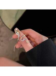 Adjustable Sparkling Crystal Snake Ring For Women And Teen Girls, Elegant Open Coil Design With Dazzling Cubic Zirconia In Chic Serpent Shape, Flexible Fit For Multiple Finger Sizes, Unique Statement Jewelry For Parties, Daily Wear, Fashion Events, Costume Occasions, Symbolic Serpent Ring With Glamorous Shine, Great Gift Idea For Bold And Stylish Women