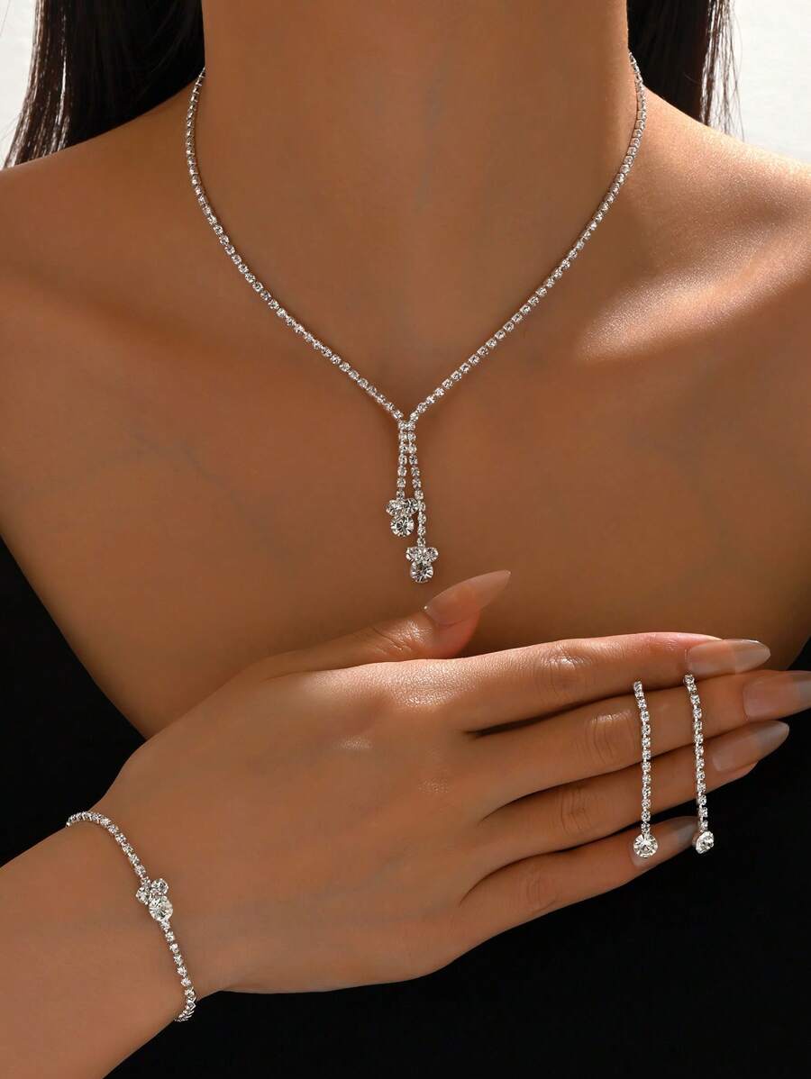 Conjunto de joyería de 4 piezas de collar, aretes y pulsera con diseño minimalista y de moda, con cadenas con garras de cobre y diamantes, perfecto para ocasiones formales