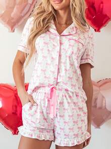 Conjunto de mujer con blusa de manga corta con estampado de moño y shorts con volantes - Rosa - Ver 3