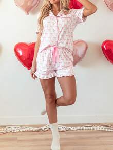 Conjunto de mujer con blusa de manga corta con estampado de moño y shorts con volantes - Rosa - Ver 2