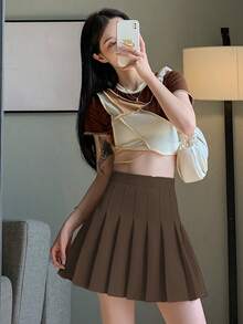 Falda plisada de cintura alta para mujer, falda corta de verano, estilo universitario, estilo japonés y coreano, falda ajustada de línea A de color sólido, falda antiexposición - Caqui - Ver 5