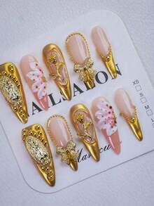 10 件奢华风格 3D 花形长尖按压指甲，金色手工假指甲，裸粉色作为底色，搭配奢华金色配饰：蝴蝶结、玫瑰，高贵奢华，适合庄严场合和节日，是送给女士和女孩的完美礼物 - 金色 - 查看 3