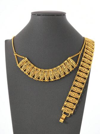2-delat set med ihåliga, breda ansiktstotem-smycken i guld, 1 halsband och 1 armband