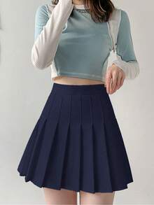 Falda plisada de cintura alta para mujer, falda corta de verano, estilo universitario, estilo japonés y coreano, falda ajustada de línea A de color sólido, falda antiexposición - Azul Marino - Ver 5