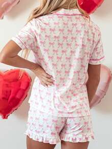 Conjunto de mujer con blusa de manga corta con estampado de moño y shorts con volantes - Rosa - Ver 6