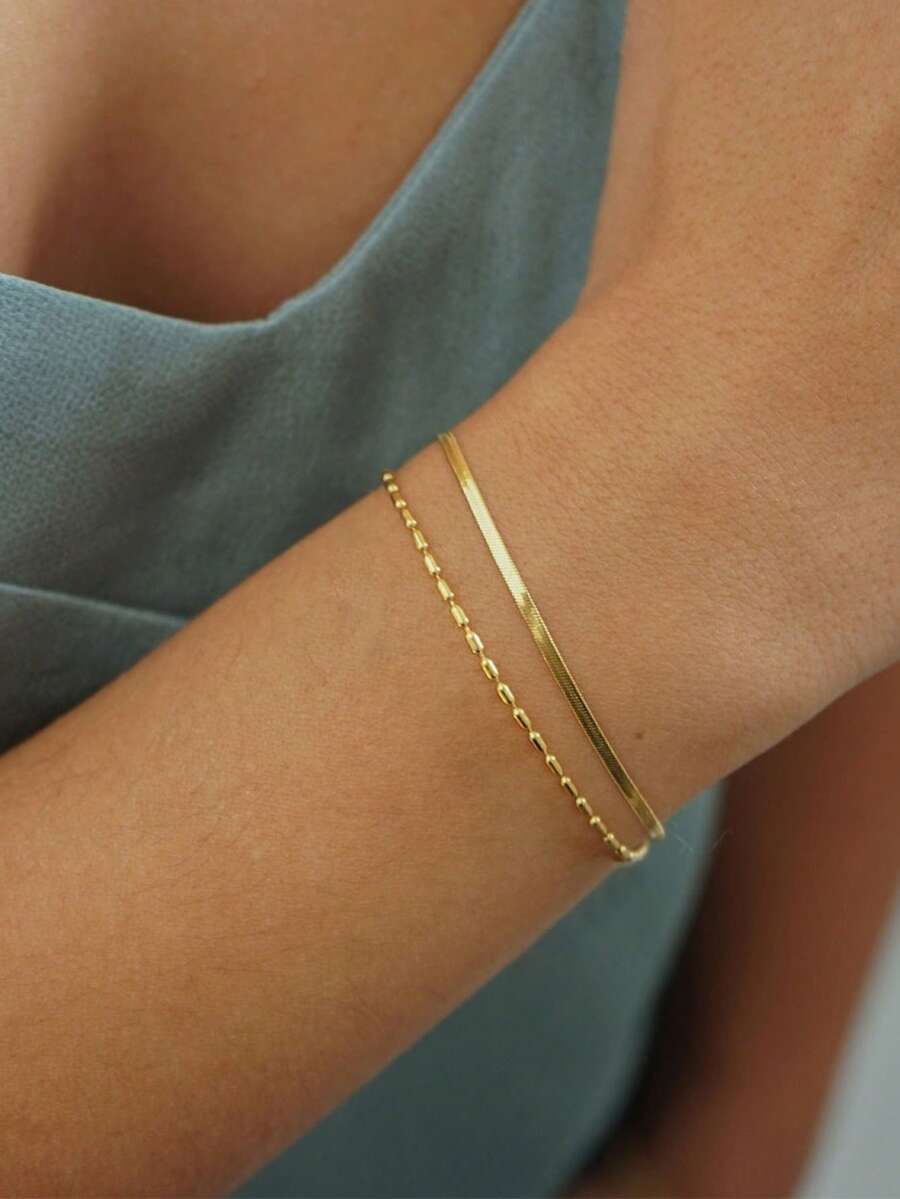 Nooxian 1 pieza Pulsera informal de mujer elegante y sencilla de acero inoxidable con doble capa dorada