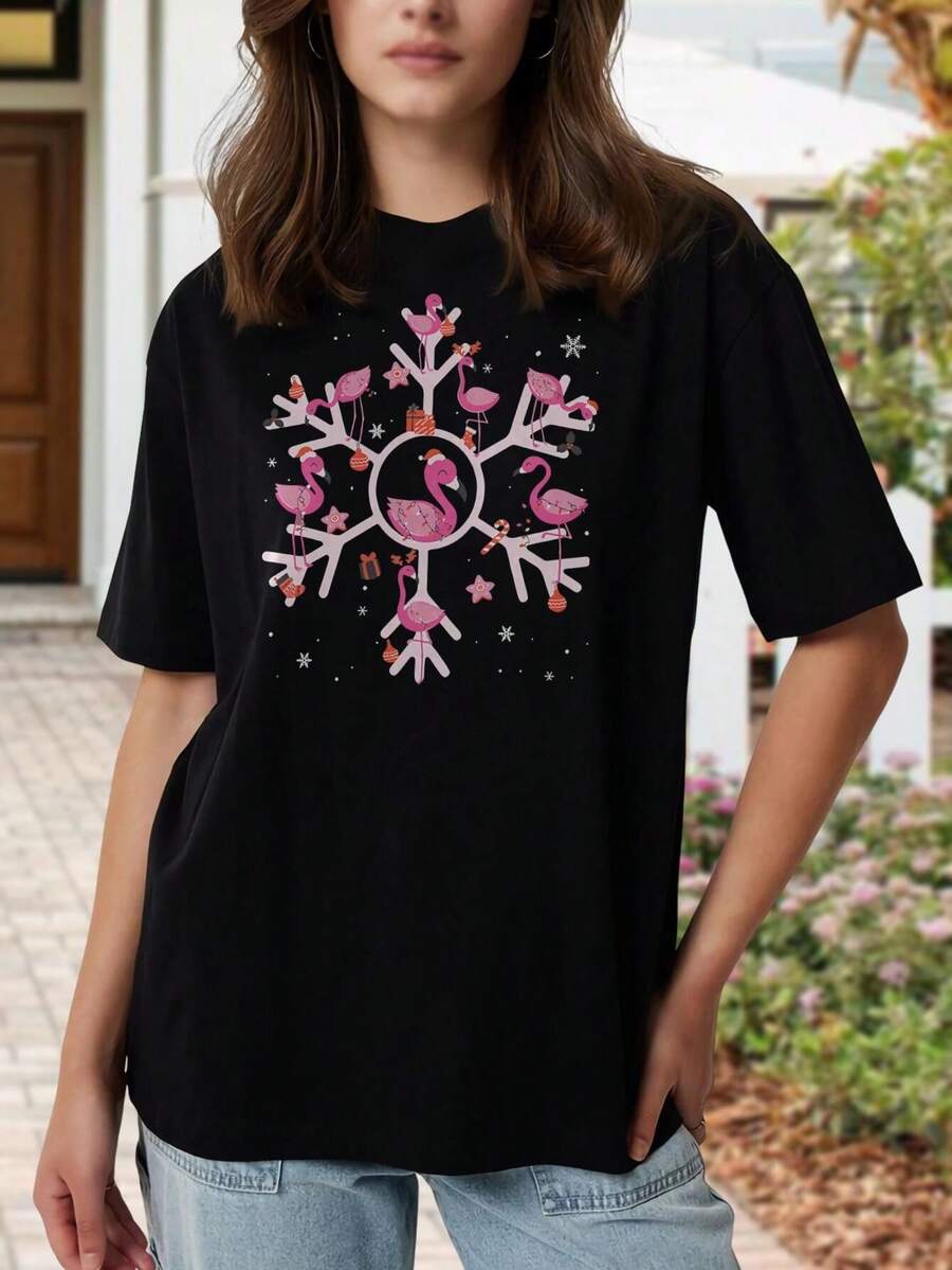Camiseta de manga corta con estampado de flamenco y copo de nieve navideño para mujer | Linda camiseta navideña para un estilo festivo | Cuello redondo, manga corta, para mujeres y jóvenes | Camiseta informal de Navidad, perfecta para fiestas y regalos - Negro - Ver 1
