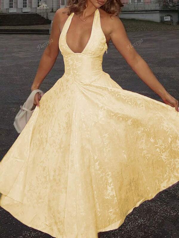 Vestido elegante con cuello en V, cintura entallada y corte evasé de longitud media, tela con estampado romántico y texturizado para vacaciones