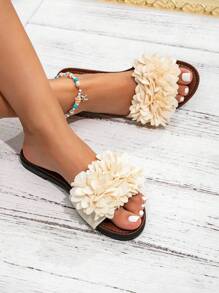 Sandalias planas de moda para mujer de primavera/verano, elegantes sandalias planas minimalistas color beige, sandalias de estilo europeo y americano, zapatillas de mujer con decoración de flores blancas