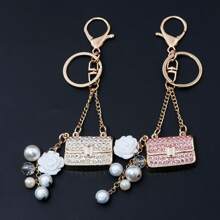 rongji jewelry Llavero de bolso con flor de cristal de Rhinestone con colgante de bolso con cristal brillante y dije de perla falsa para mujeres