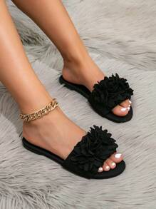 Sandalias planas de mujer de estilo primavera/verano, sandalias planas minimalistas elegantes, sandalias deslizantes negras con banda trenzada de moño de una sola pieza
