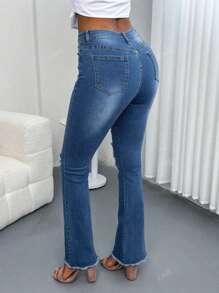 Jeans acampanados elásticos desgastados para mujer
