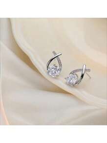 Gold Tone Teardrop Stud Earrings With Criss-Cross Cubic Zirconia Accents, Elegant Round-Cut Center Stone For Maximum Sparkle, Lightweight And Comfortable Design, Perfect For Work, Special Occasions, Weddings, Or Daily Wear, Beautiful Gift For Women And Teen Girls Who Appreciate Classic, Refined, And Glamorous Jewelry.
