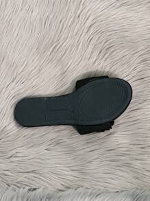 Sandalias planas de mujer de estilo primavera/verano, sandalias planas minimalistas elegantes, sandalias deslizantes negras con banda trenzada de moño de una sola pieza