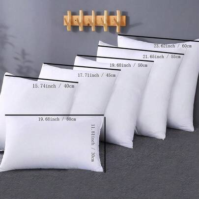 1个白色方形枕芯，采用磨毛面料制成，带拉链，可拆卸可水洗，压缩包装便于运输，柔软蓬松的抱枕，适合家居装饰，可放置在沙发、床、卧室或旅行途中，简约的礼品之选。