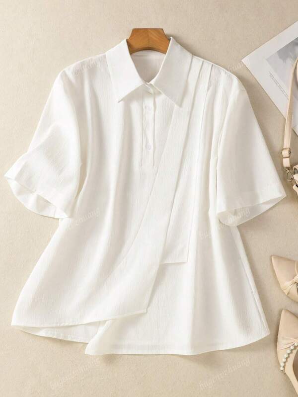 Camisa feminina de cor sólida com lapela assimétrica e botões - Blusa casual chique de manga curta para encontros noturnos, viagens e traje festivo sazonal (primavera, verão e outono)