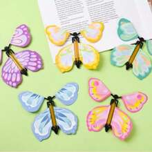 Fliegender Schmetterling Zauberkunststück - Schmetterling fliegende Bühnendeko, Spielutensilien, kann als Windspiel oder Lesezeichen verwendet werden, interaktives Unterhaltungsspiel, zufällige Farbe & Stil