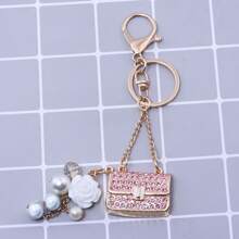 rongji jewelry Llavero de bolso con flor de cristal de Rhinestone con colgante de bolso con cristal brillante y dije de perla falsa para mujeres