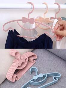 10pcs/20pcs/30pcs Children's Hangers, Lightweight Plastic Hangers With Anti-Slip Design, Suitable For Children's Shirts, Pants, Skirts And Coats. Flat And Space-Saving Structure, Suitable For Wardrobe Organization In Bedrooms, Laundry Rooms And Children's Rooms. Multi-Functional Dry And Wet Dual-Purpose Bow Hanger - A Great Gift For Home Storage - Multicolor - View 6