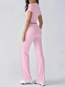 Spring And Autumn Women's Fashionable Navel-Baring Short-Sleeved Tops, Slim-Fitting Lace-Up Flared Pants Sports Suits