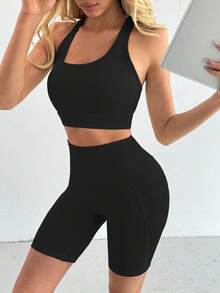 Büsten-verstärkender Bustier & hochgeschnittene formende Shorts, po-hebende Shorts, Campus Chic für Workouts und Straßenmode, Rückenfreies Trainings-Top mit konturierenden Shorts, nahtloser Übergang vom Studio in die Stadt, Brust-definierende Ausschnittpartie, hochgeschnittene Kompression, Rücken-akzentuierende Aussparungen, Workout-Bustier und Shorts, Damen Workout Zweiteiler - Schwarz - Übersicht 3