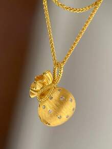 1pc Bowknot Textured Lucky Bag Pendant Necklace, Fashionable Elegant Gold-Tone Copper Necklace Suitable For Women's Daily Wear, Dates, Banquets, Parties, Jewelry Gift