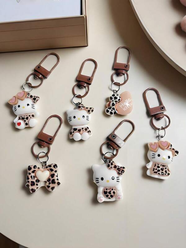 Sanrio Portachiavi con ciondolo a forma di gatto KT leopardato, portachiavi glitterato, pendente da borsa, portachiavi carino a forma di cane cannella, portachiavi con personaggio anime, ornamento da scrivania, decorazione confortevole per casa e auto, regalo di Natale, regalo di compleanno, miglior regalo per coppie e fidanzate