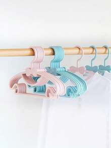 10pcs/20pcs/30pcs Children's Hangers, Lightweight Plastic Hangers With Anti-Slip Design, Suitable For Children's Shirts, Pants, Skirts And Coats. Flat And Space-Saving Structure, Suitable For Wardrobe Organization In Bedrooms, Laundry Rooms And Children's Rooms. Multi-Functional Dry And Wet Dual-Purpose Bow Hanger - A Great Gift For Home Storage - Multicolor - View 11