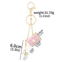 rongji jewelry Llavero de bolso con flor de cristal de Rhinestone con colgante de bolso con cristal brillante y dije de perla falsa para mujeres