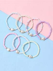 Set de 7 piezas de pulseras con cuentas de corazones, estrellas y dijes de colores para niñas, adecuadas para uso diario, fiestas y regalo de cumpleaños