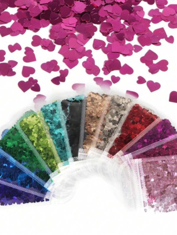 12 حزمة/مجموعة من فن الأظافر، تشمل قطع لامعة مختلطة بشكل قلب، وديكورات فنية، وإكسسوارات مثل ملء الفراغات