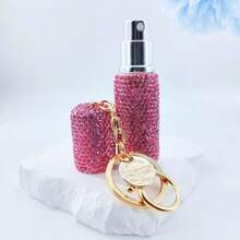 1个5毫升香水喷雾瓶，镶钻装饰/带钥匙扣，方便携带的香水喷雾器，可重复灌装的储物瓶，底部灌装，自动按压，可重复使用的喷雾瓶，便携式化妆品容器，适用于家居用品、旅行、生日礼物、新年礼物、女性时尚配饰！