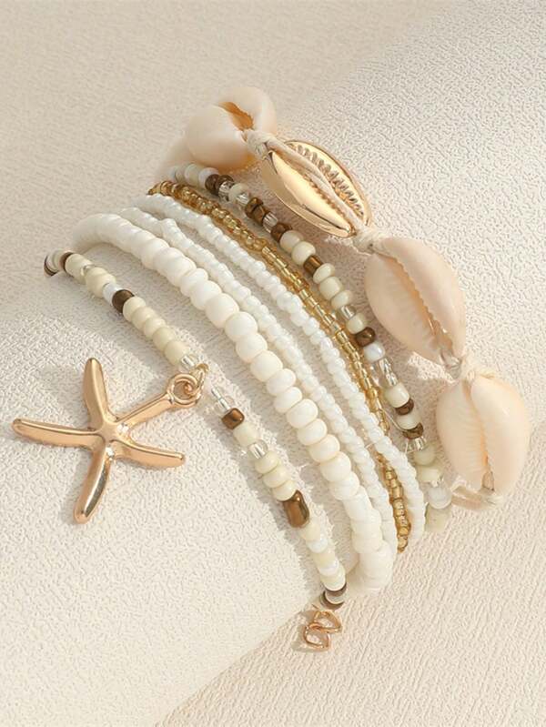 7 Stücke Armband Set im Boho-Stil mit Perlen, Muschelanhängern, Kunststoffperlen und Seestern Charms, geeignet für Frauen (Zufällige Farbe)