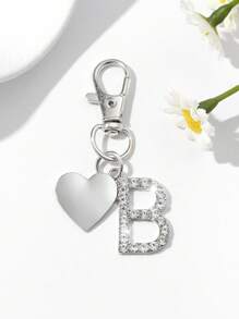 1pc Fashionable European American Luxury Heart Hollow English Letter Shaped Key Chain Pendant, Studded With Rhinestones, Suitable For Women Car Key, Bag Decor, Birthday Gift