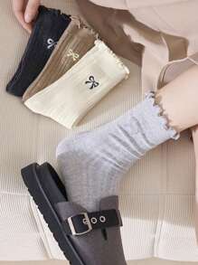 4 pares de calcetines tipo tripulación cómodos y versátiles para mujer con volantes y moños en un estilo aleatorio y dulce
