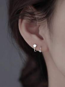 1 paire de clips d'oreilles en forme de cœur à ressort