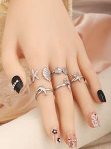 Juego de 5 anillos abiertos de acero inoxidable con diseños de vida marina como concha, estrella de mar y delfín, unisex