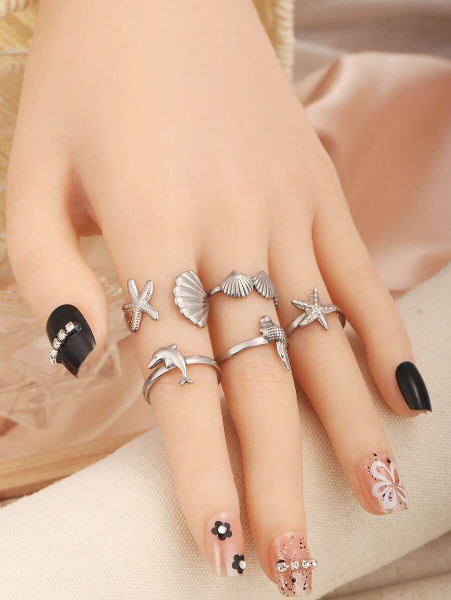 Juego de 5 anillos abiertos de acero inoxidable con diseños de vida marina como concha, estrella de mar y delfín, unisex