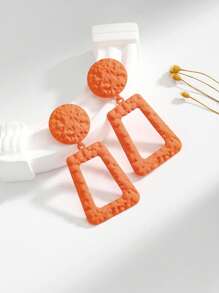 1 par de brincos geométricos minimalistas e modernos em laranja