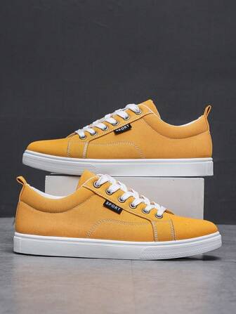 男士简约时尚休闲运动滑板鞋，低帮透气帆布运动鞋