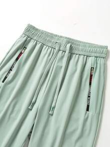 1pc Women's Lightweight Ice Silk Sports Pants, Breathable Quick-Dry, With Ankle Cuffs, Drawcord Waist, Zipper Pockets, Suitable For Outdoor Activities And Casual Walking