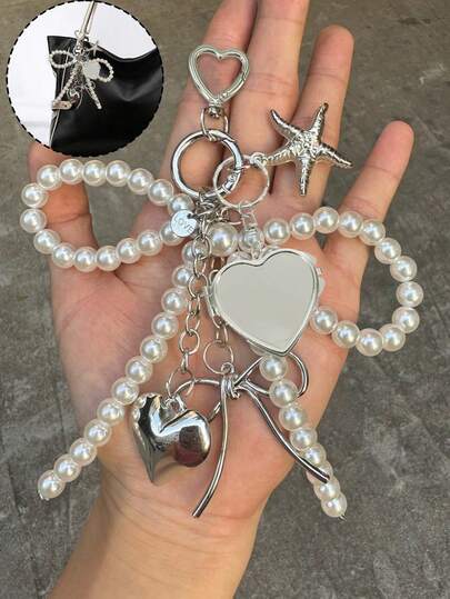 1 pieza Colgante unisex con lazo de cuentas estilo Y2K, Colgante de bolso grande con forma de corazón a la moda, Colgante de espejo con forma de corazón, Diseño de gancho giratorio con forma de corazón de plata, Hebilla de resorte, Elementos de estrellas de mar, lazos y con forma de corazón, Llavero para celular