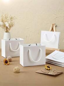 10 pièces Sacs en papier kraft blanc avec anses, sacs cadeaux blancs, sacs cadeaux de couleur unie, mini sacs de shopping portables et petits pour boutique, mariage, fête, baby shower, anniversaire, cadeaux, demoiselles d'honneur, fête des mères, remise des diplômes