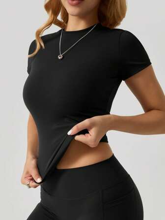 NcmRyu 1 stuk dames naadloze elastische effen kleur modieuze veelzijdige getailleerde sporttop met korte mouwen